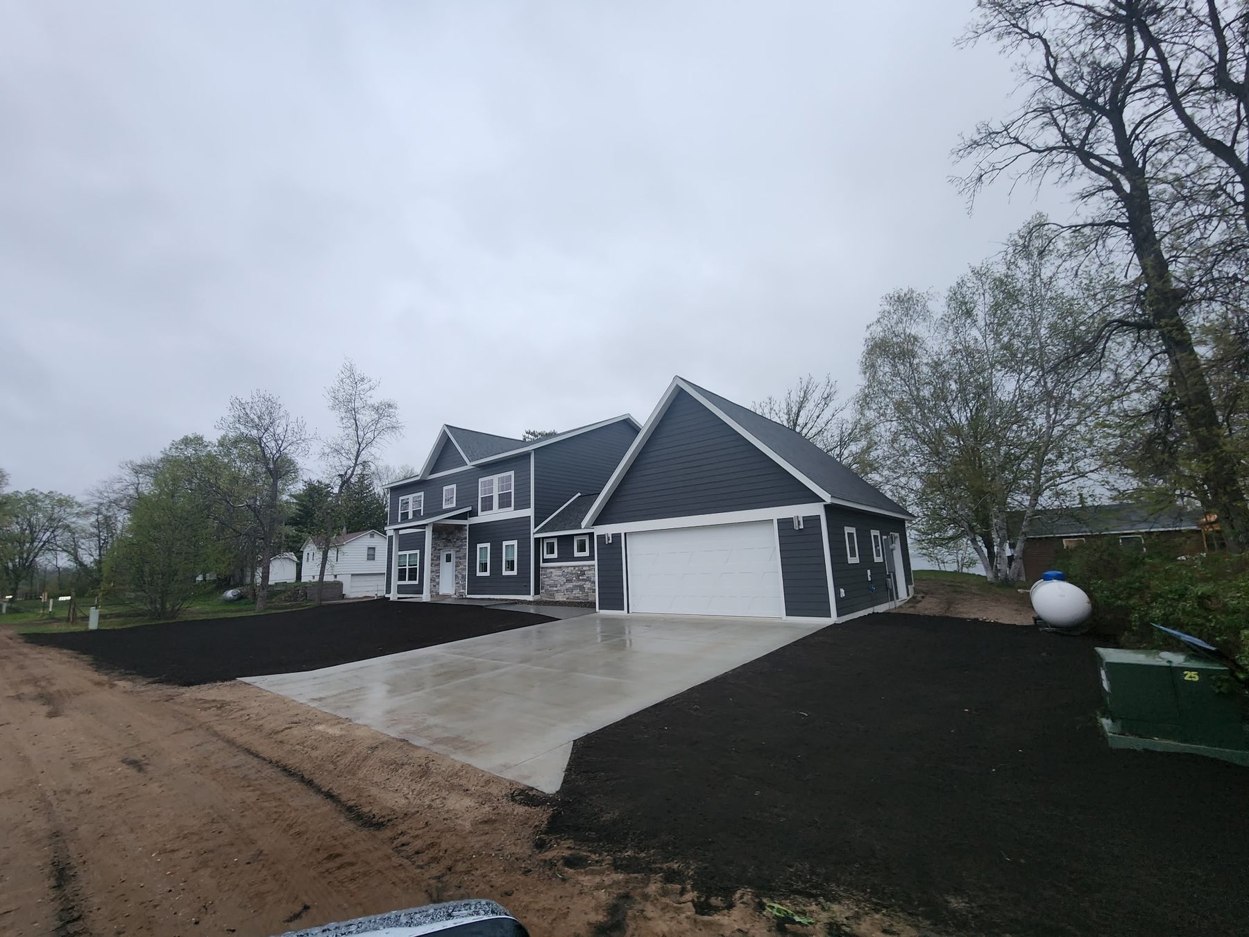 Completed finish grading around a residential property