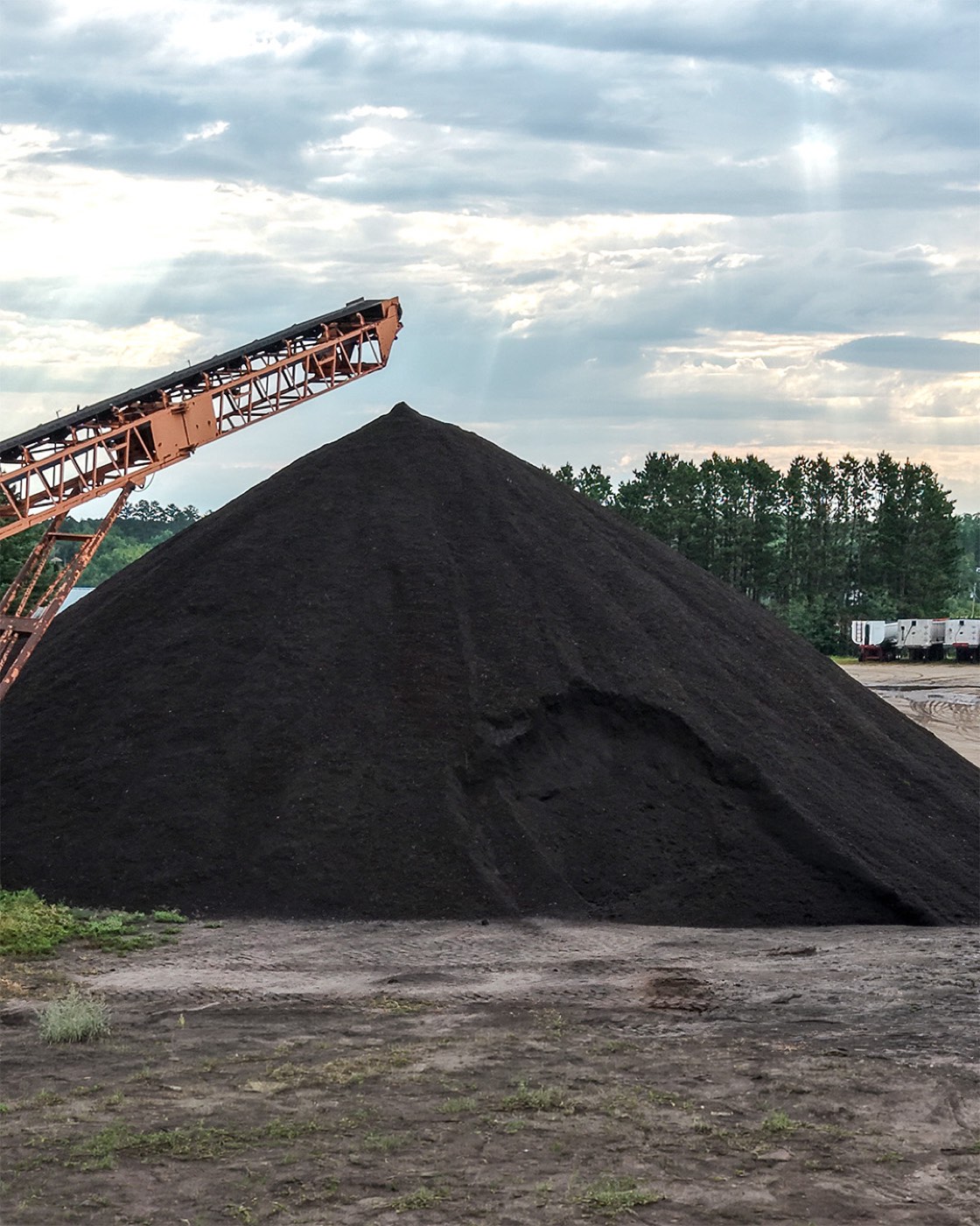 Screened black dirt and topsoil stockpile at the Storlie yard